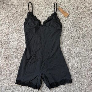 Skims Fits Everybody Lace Triangle Onesie